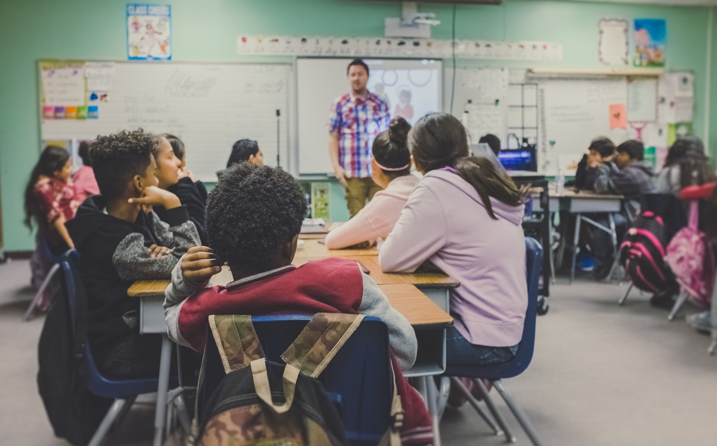 Teacher trainer mentoring a candidate online